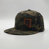 Wholesale Low Price Training PVC Rubber Patch Flat Brim 6 Panel Camo Snapback Caps Logo Custom